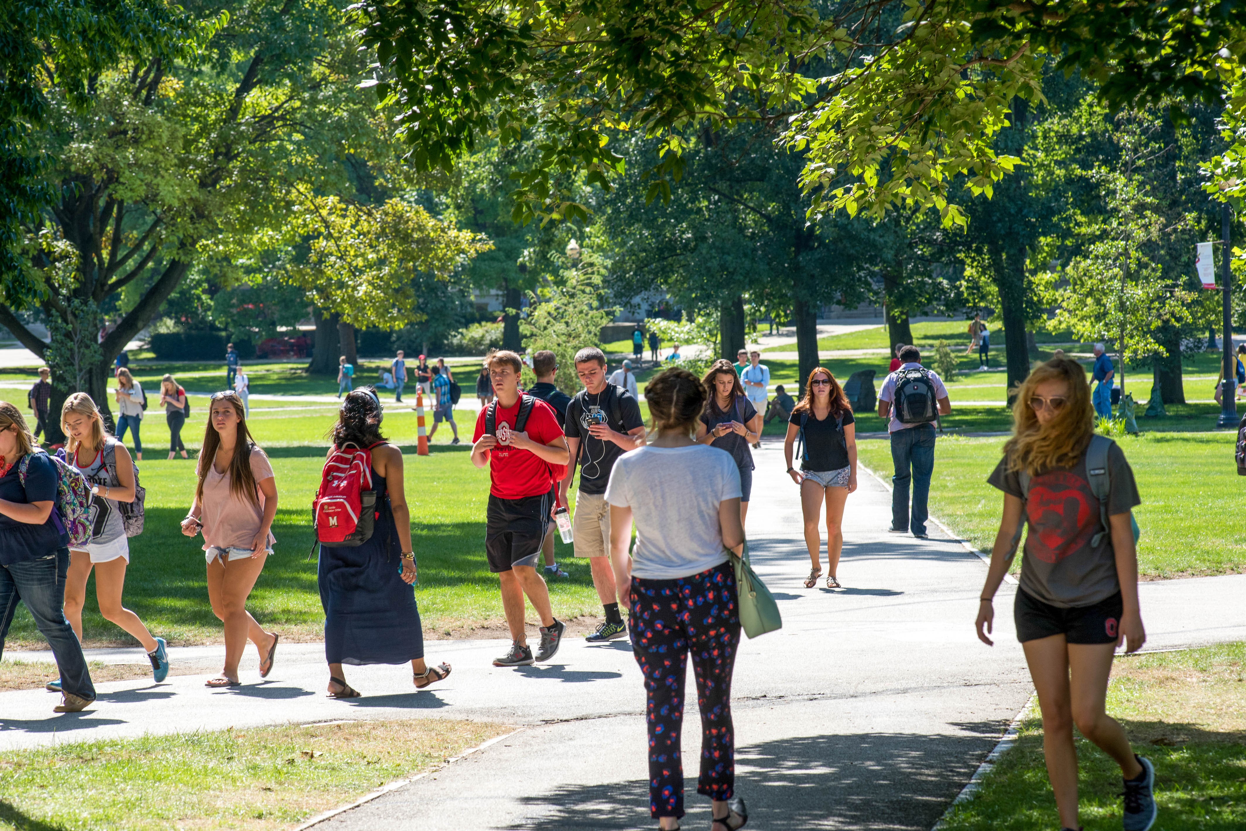 A group of students walking across the oval at The Ohio State University